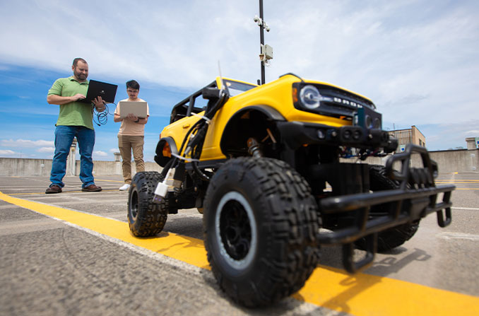 Students testing an autonomous vehicle project