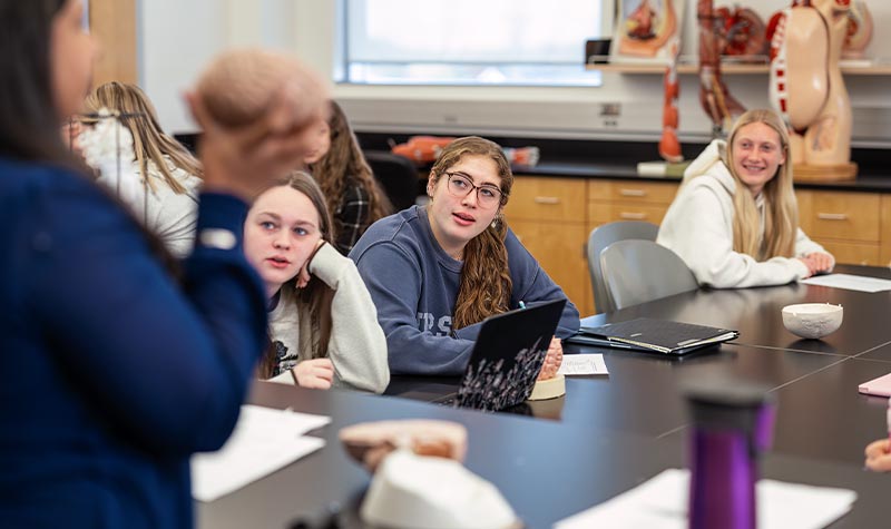 Students listening to a professor