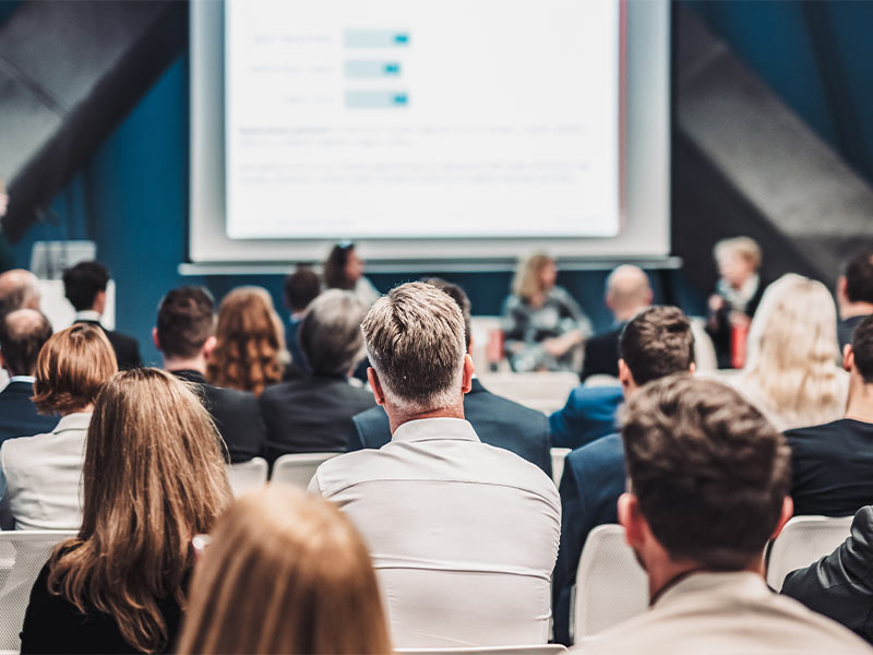 Faculty members attending a committee meeting