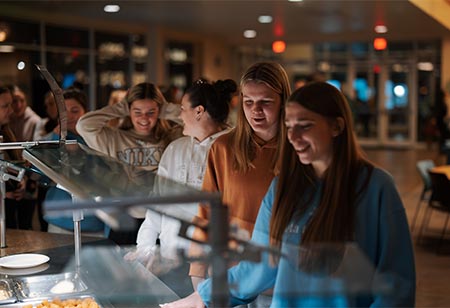 students enjoying the dining options at a PennWest dining hall