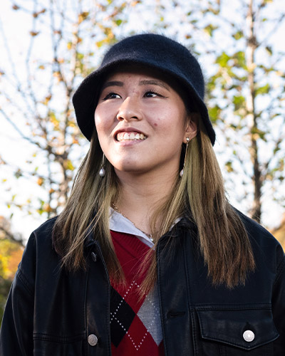 a student enjoying a walk on campus