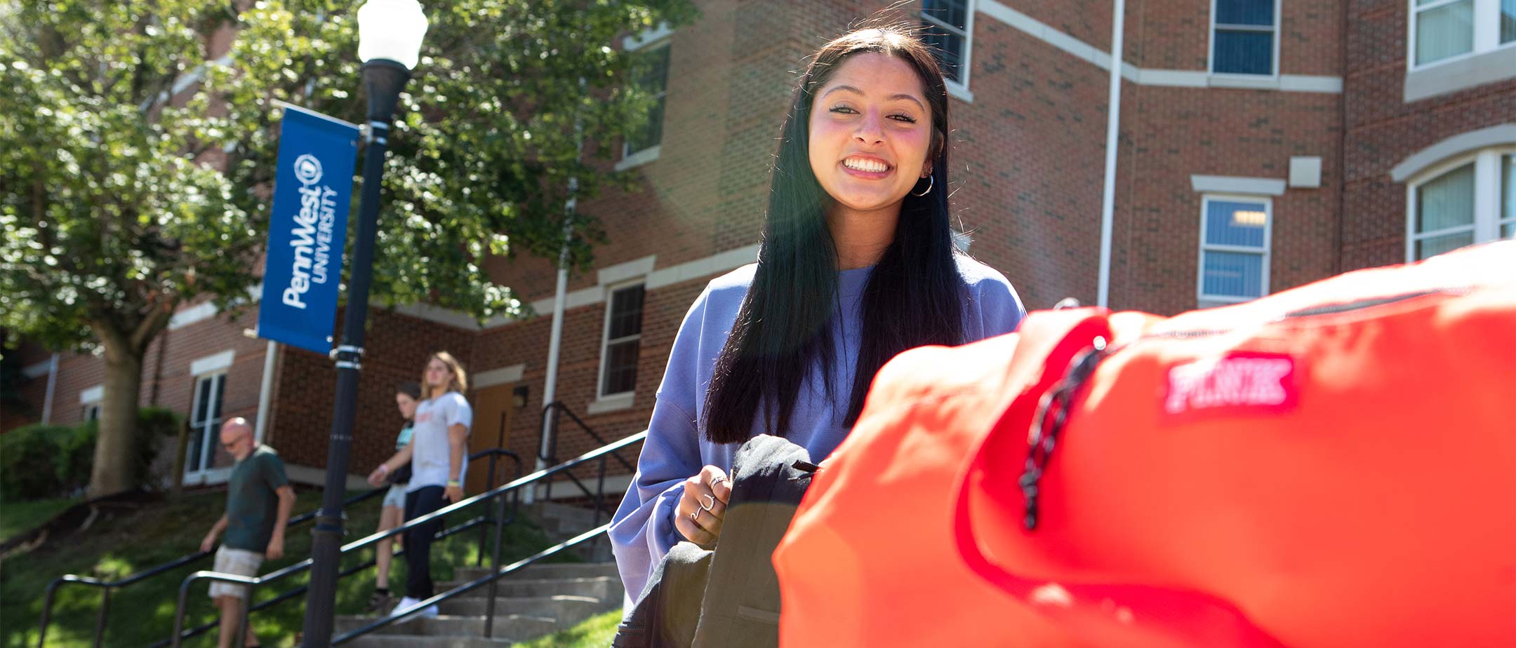 Students moving into their dorms