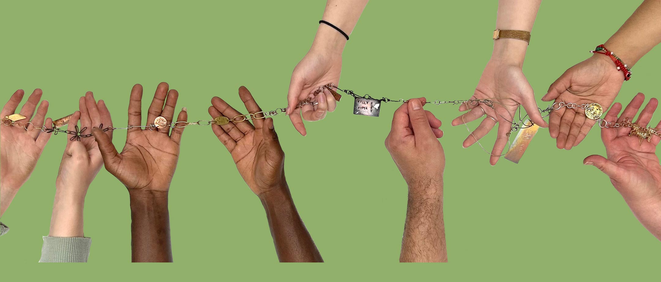 several hands holding different articles of jewelry