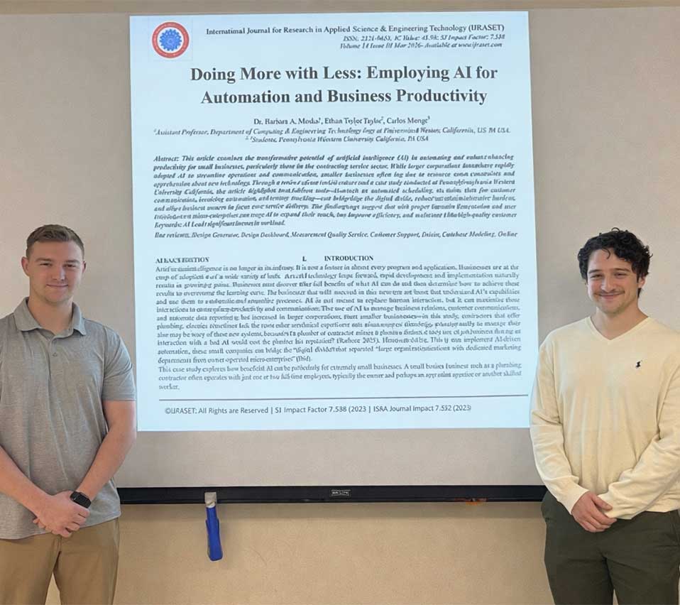 student taylor and monge presenting their capstone project