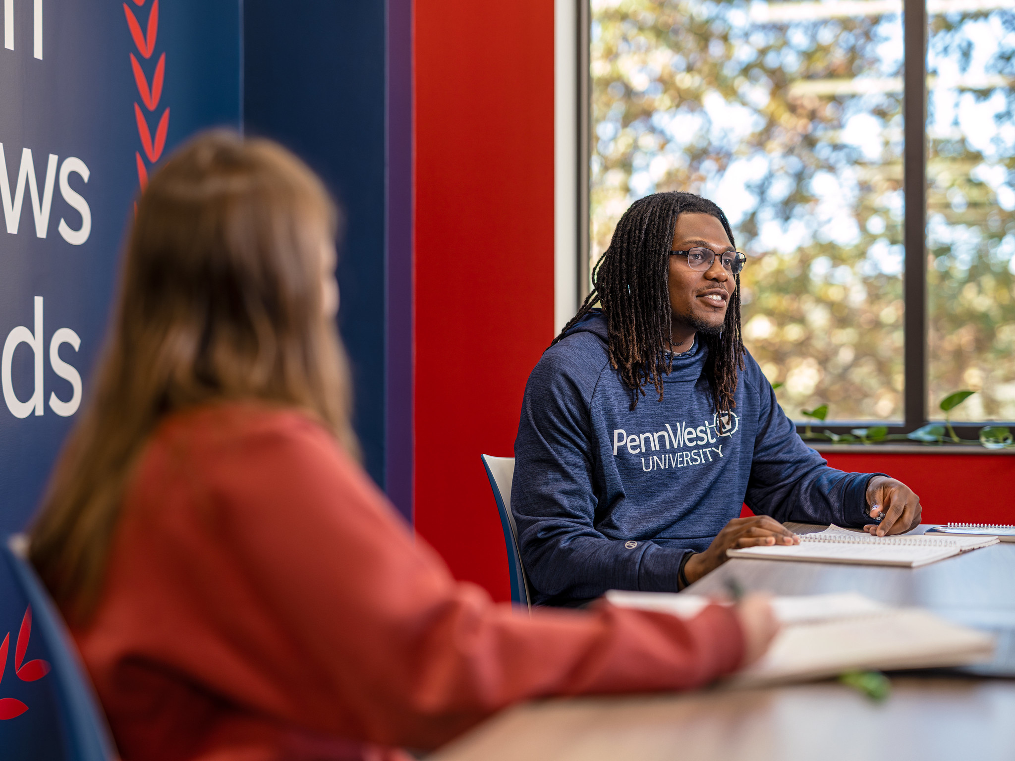 PennWest students studying in library