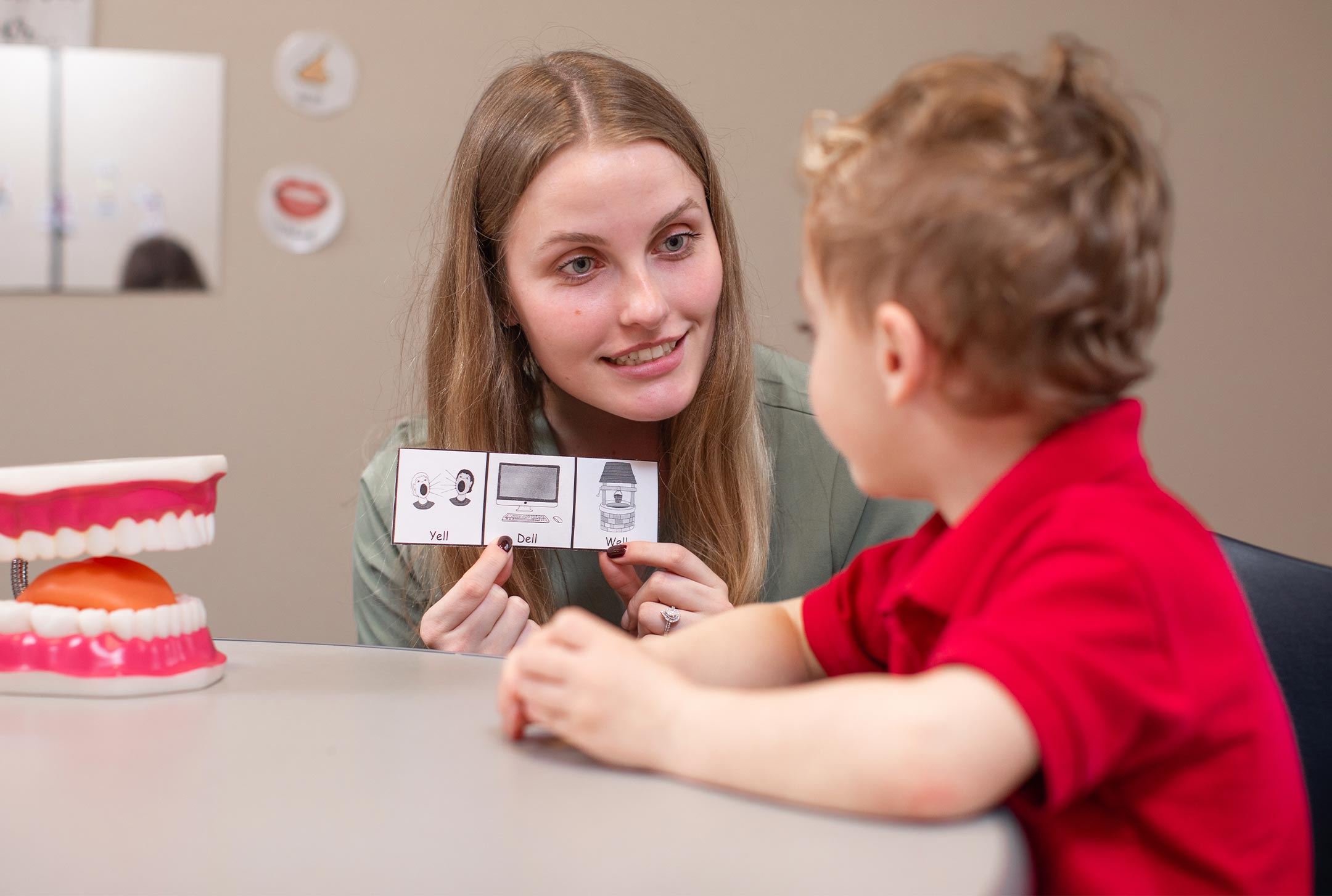 Students working with children