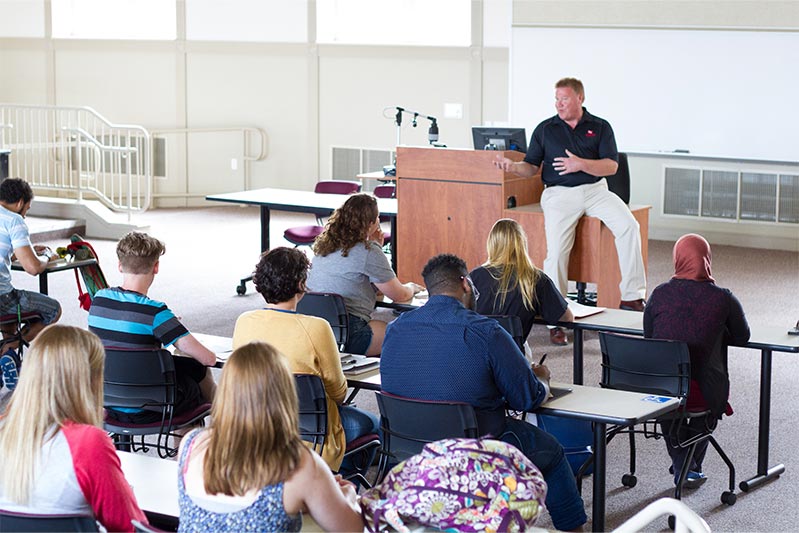 a legal professor teaching a classroom of students