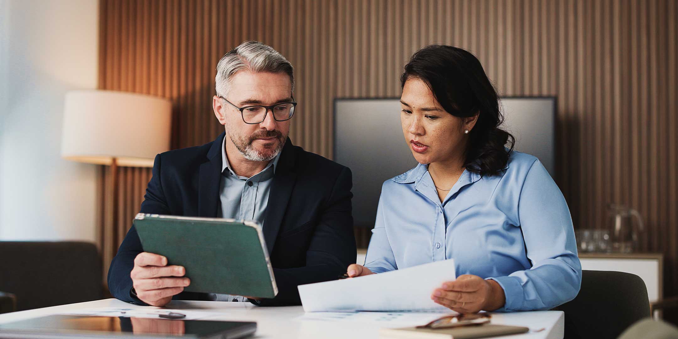 a financial planner reviewing options with a client