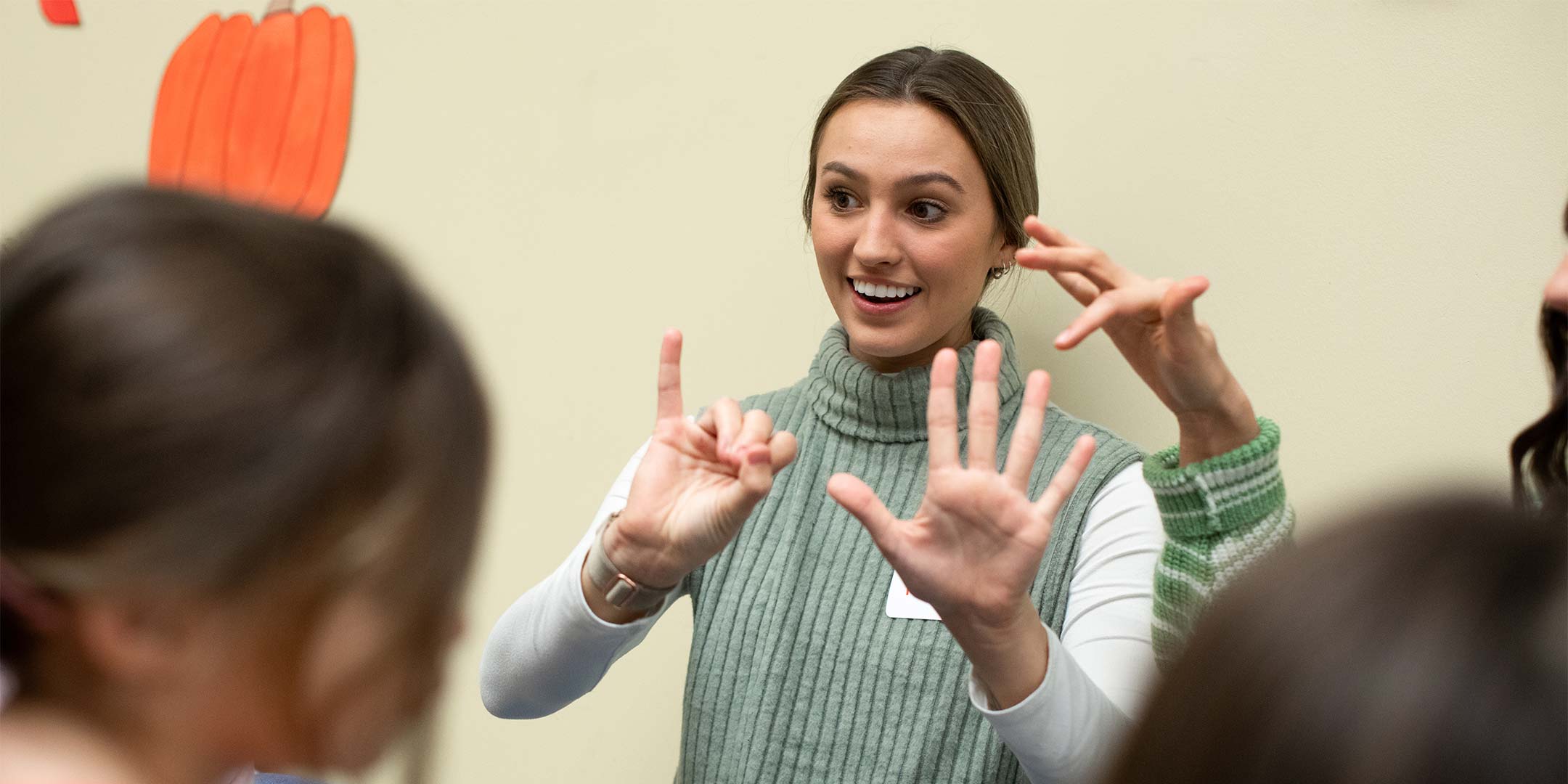 a special education student teaching a class of children