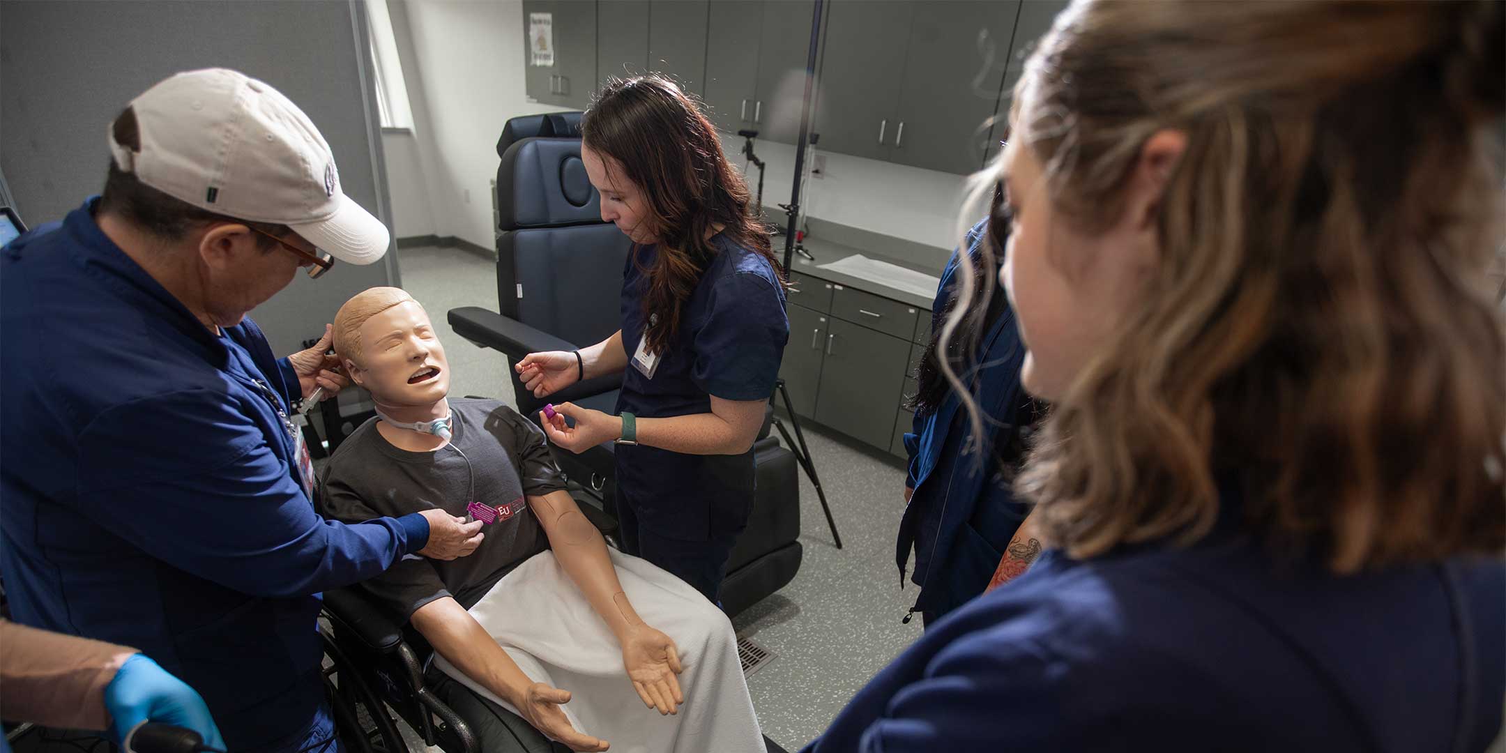 speech-language pathology students working in a lab