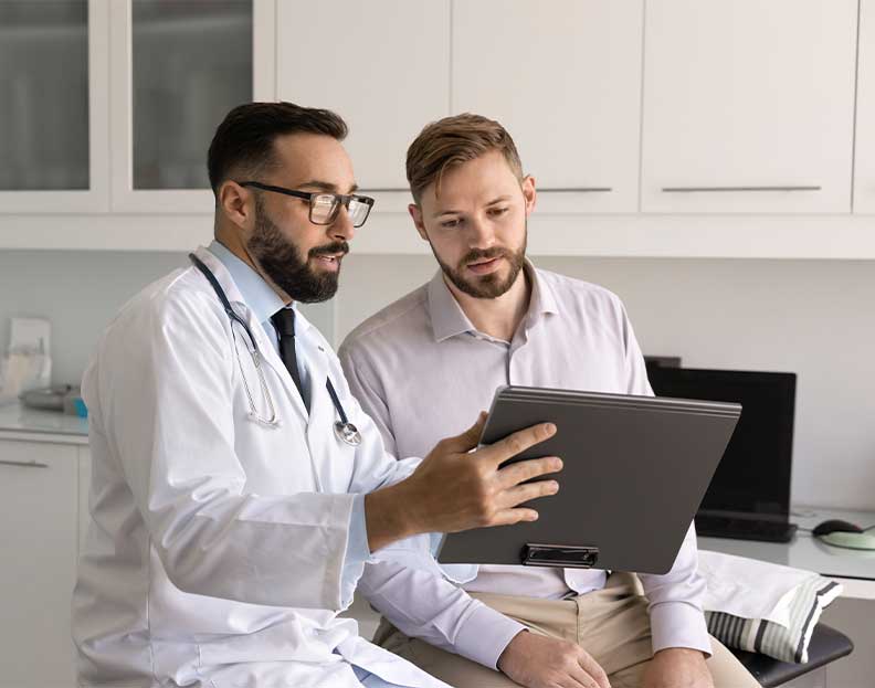 a doctor reviewing medical information with a patient