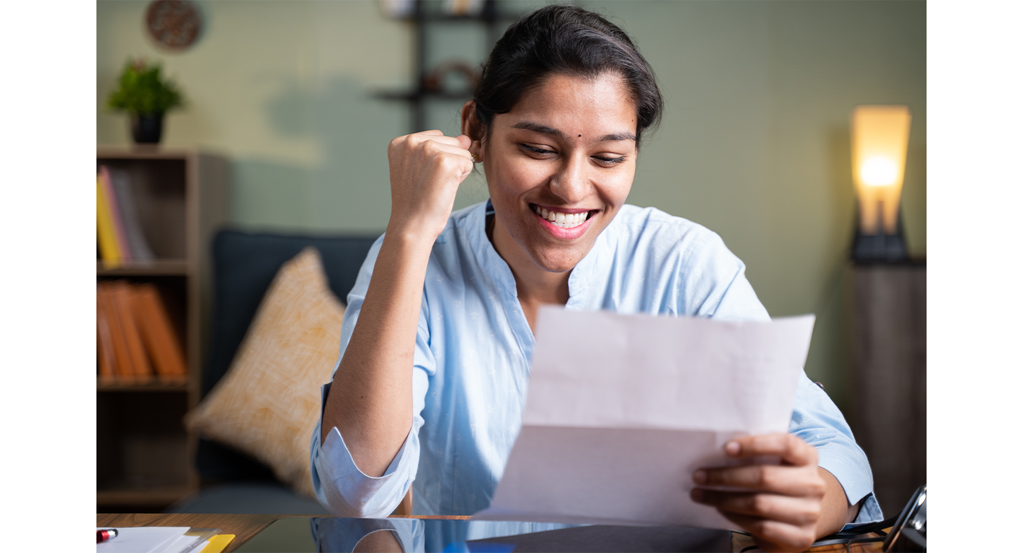 A graduate student receiving their acceptance letter