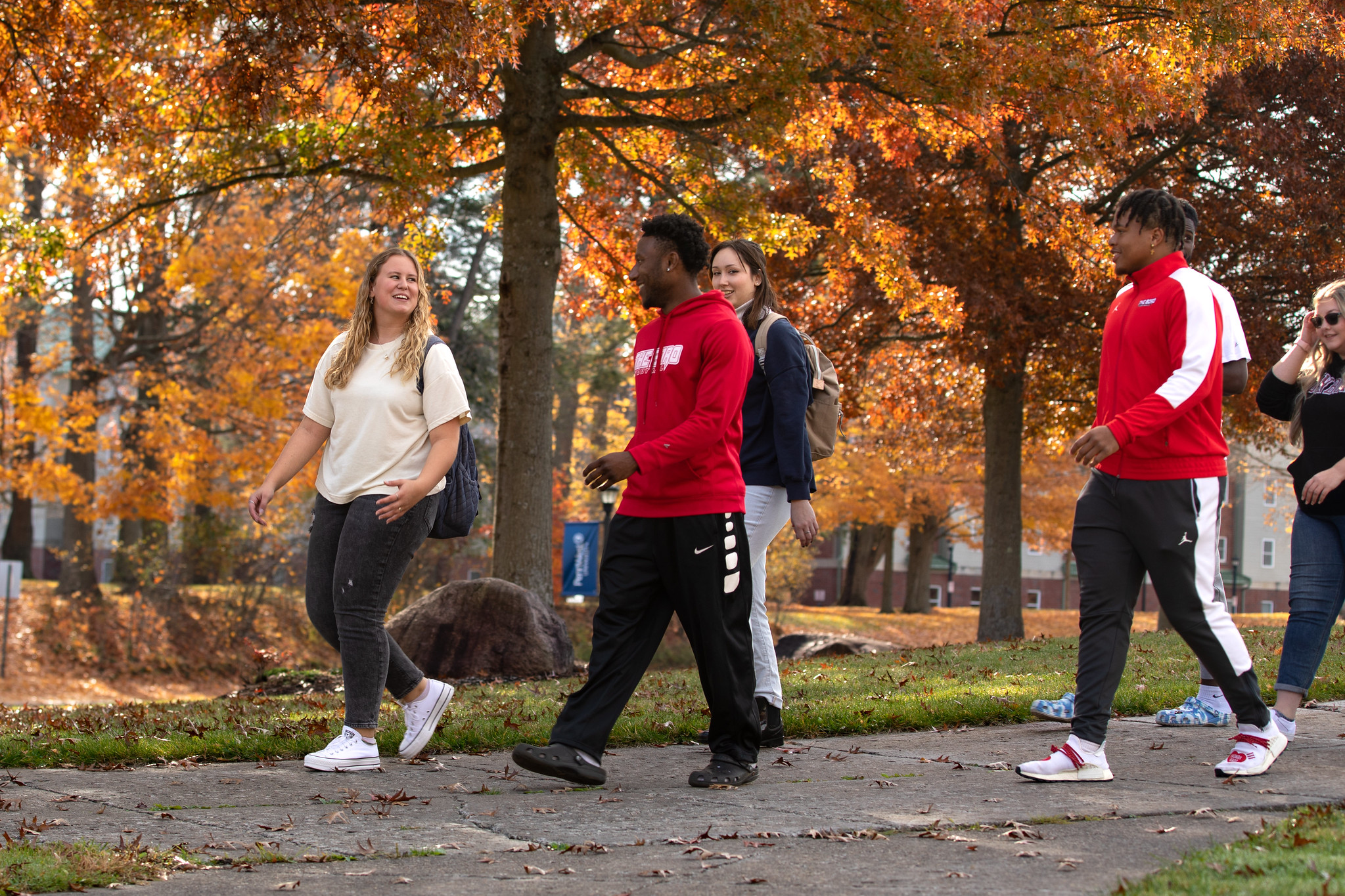 Students Walking Through Campus