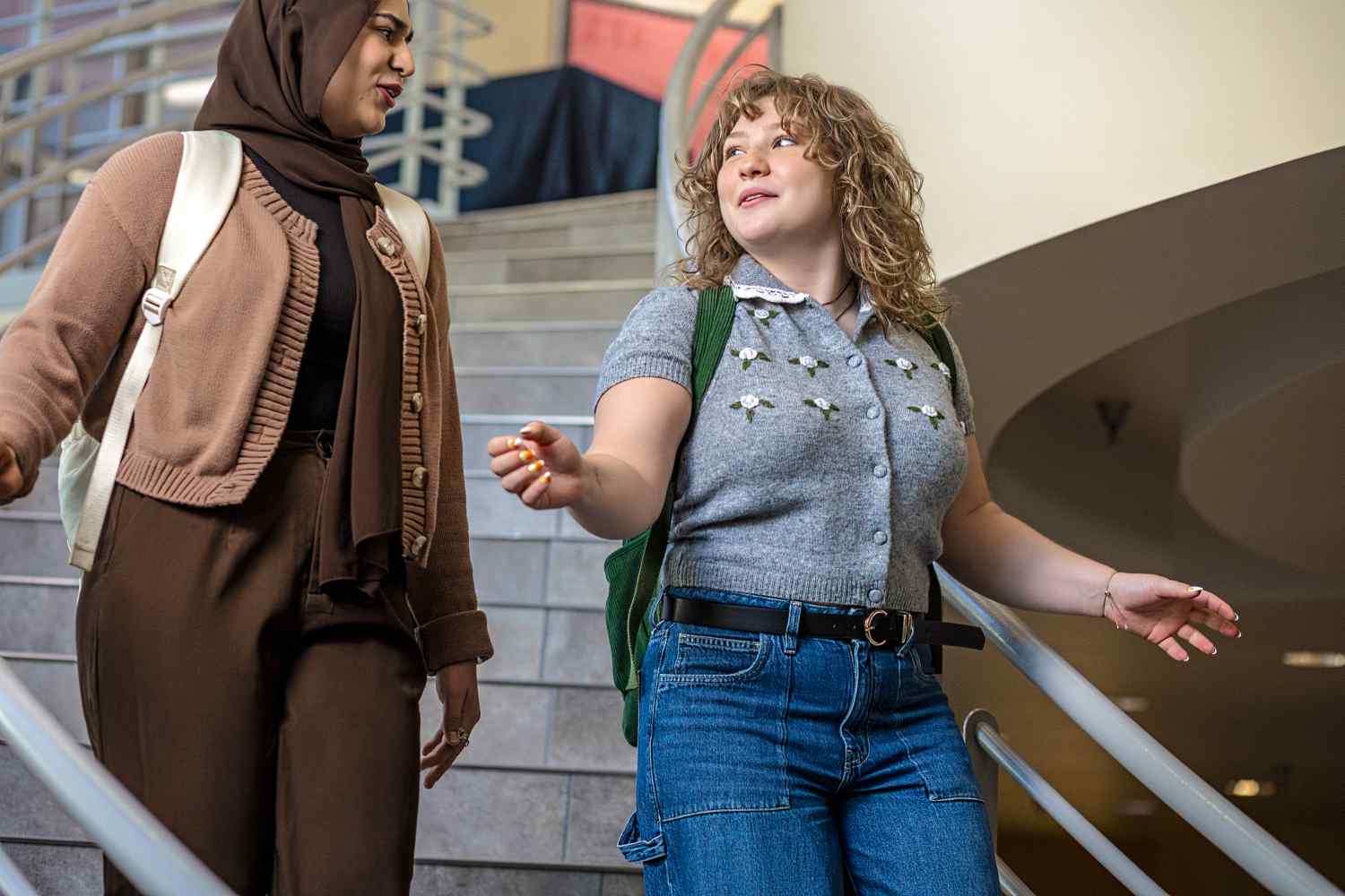 PennWest Clarion students walking down student center stairs. 