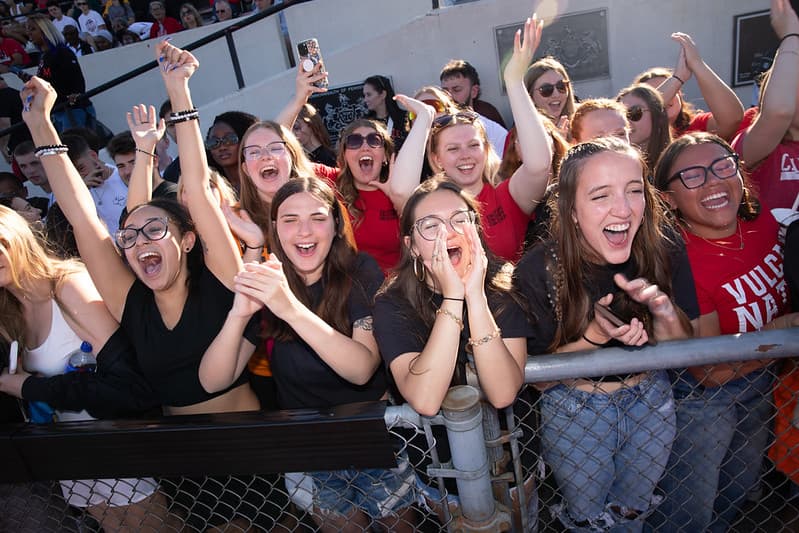 Students gather at a PennWest California football game.