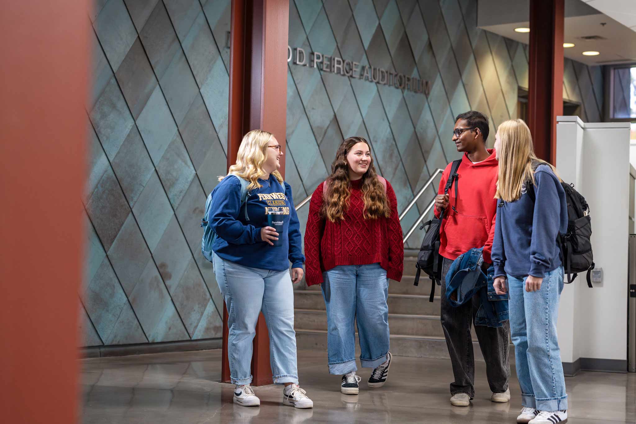 PennWest Clarion students having a discussion on campus.