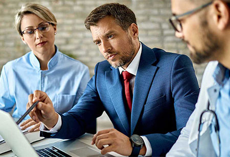 health workers discussing a solution