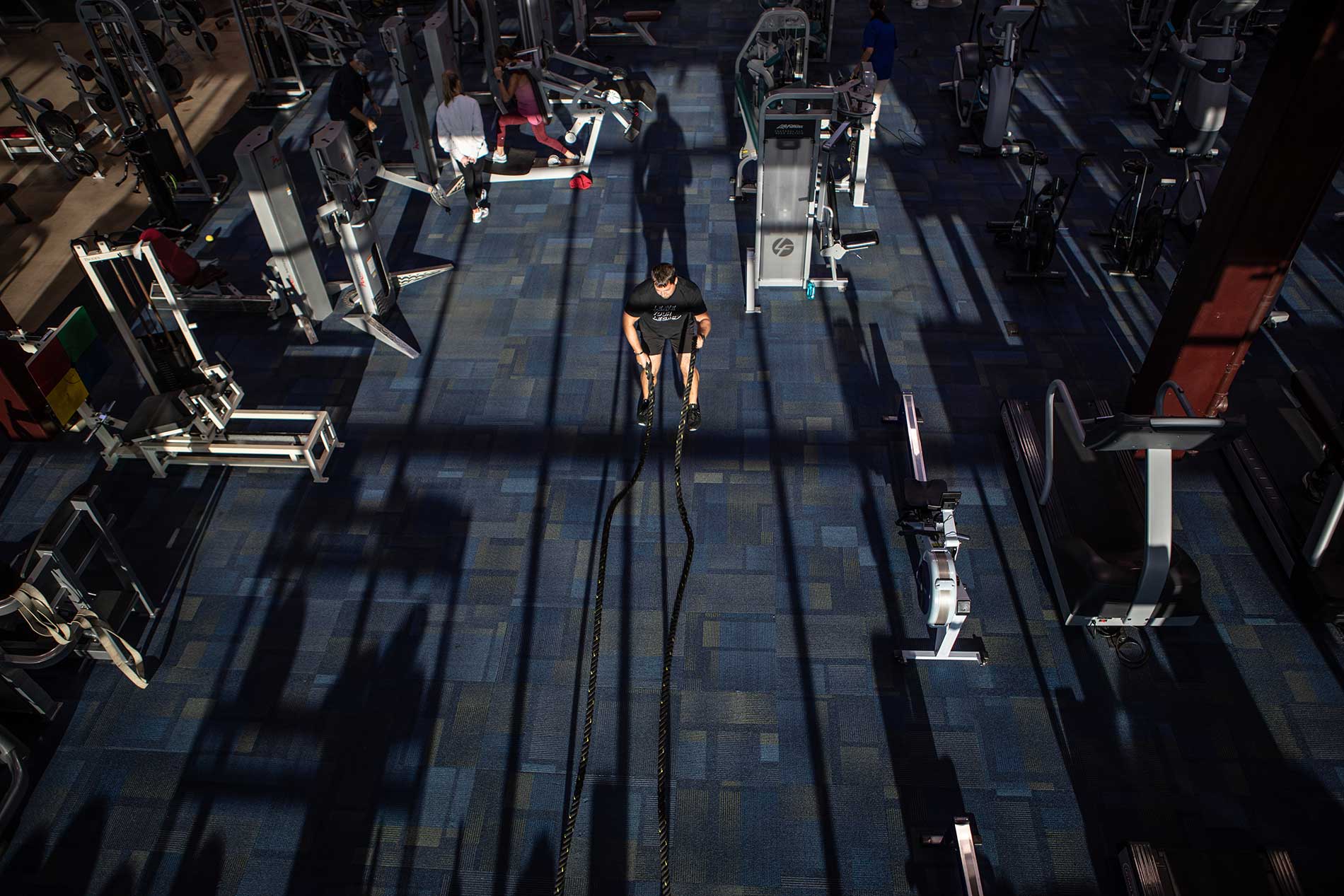 A PennWest Graduate in a gym