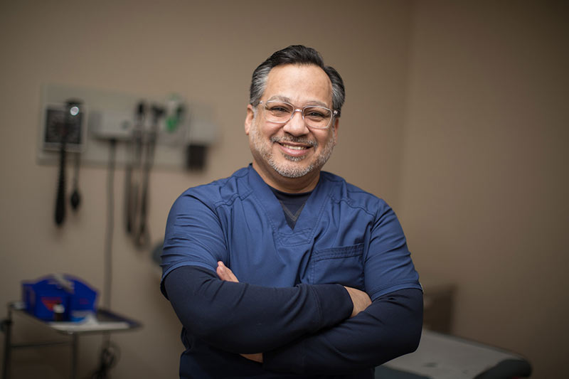 A PennWest graduate as a nurse in a hospital