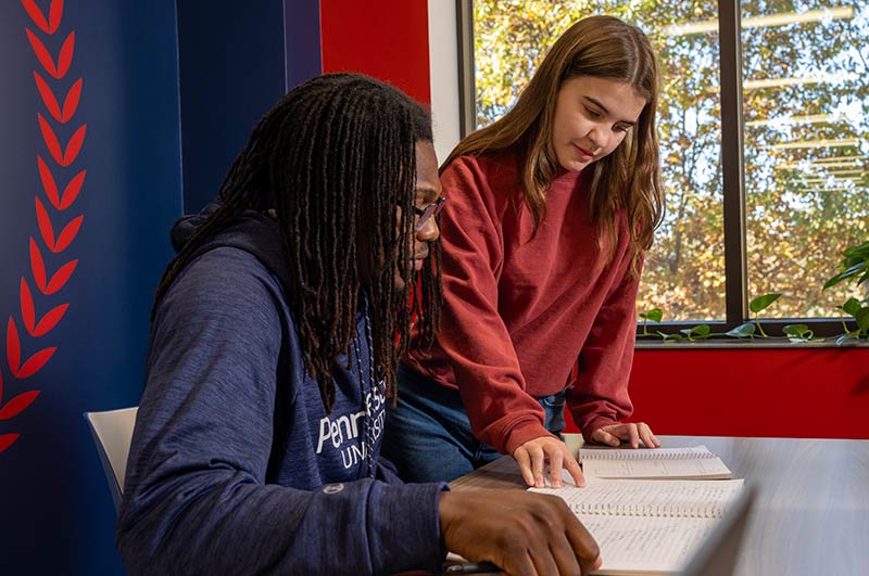 PennWest advisor helping a student