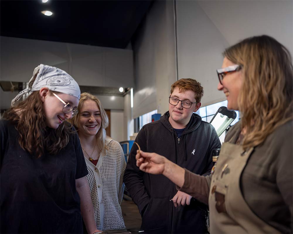 Students working with equipment in a lab