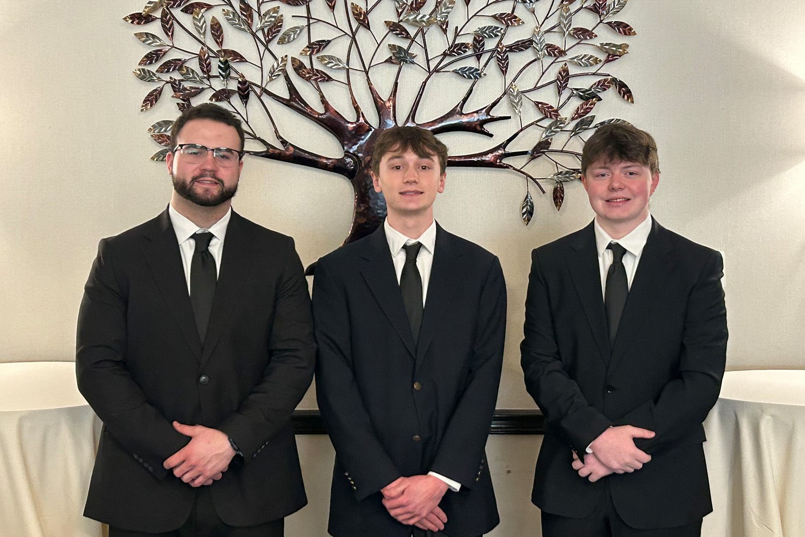 Isaac Bell, Chase Weaver and Maddox O’Neill compete at the CFA Society of Pittsburgh's Investment Research Challenge