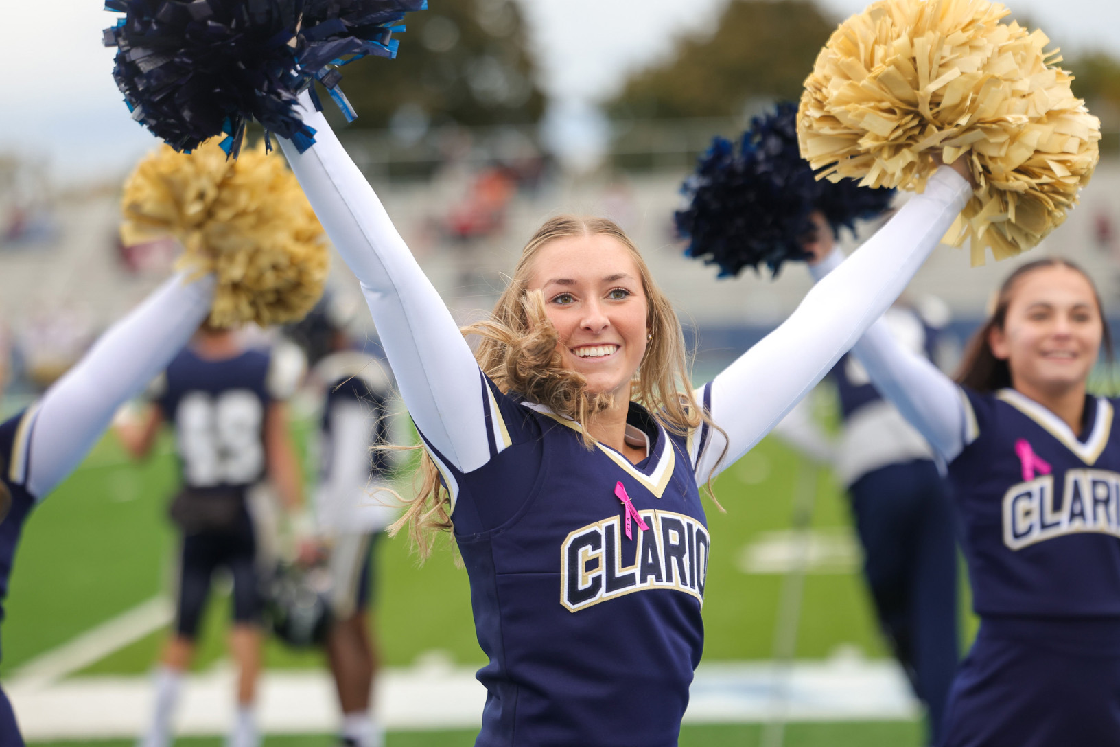 Golden Eagles cheerleaders pump up the crowd during PennWest Clarion's 2025 Homecoming celebration