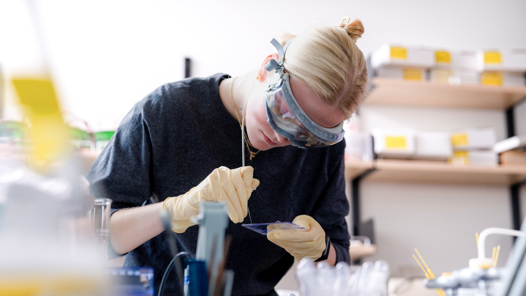 student works on a project in a lab
