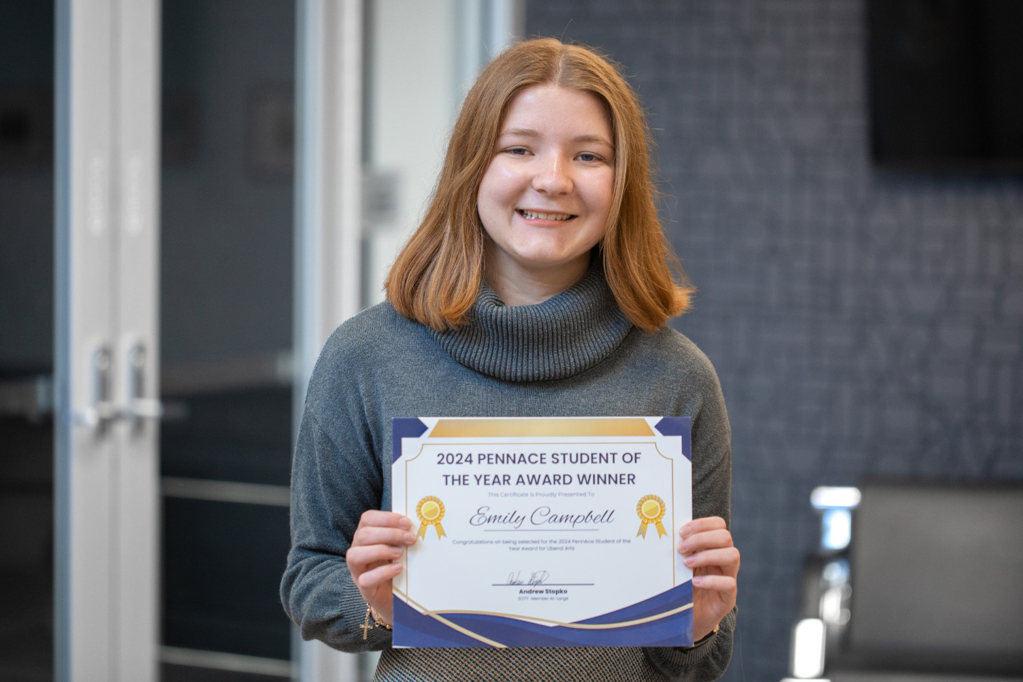 Emily Campbell with PennACE award