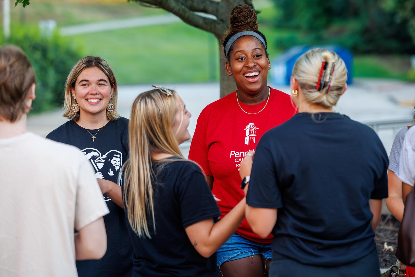 students mingle on campus