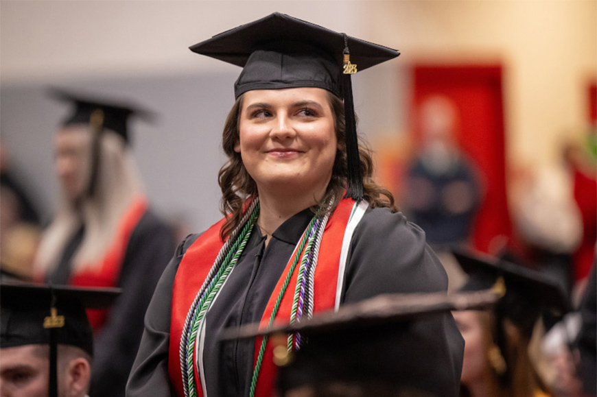 a student graduating from the Edinboro campus