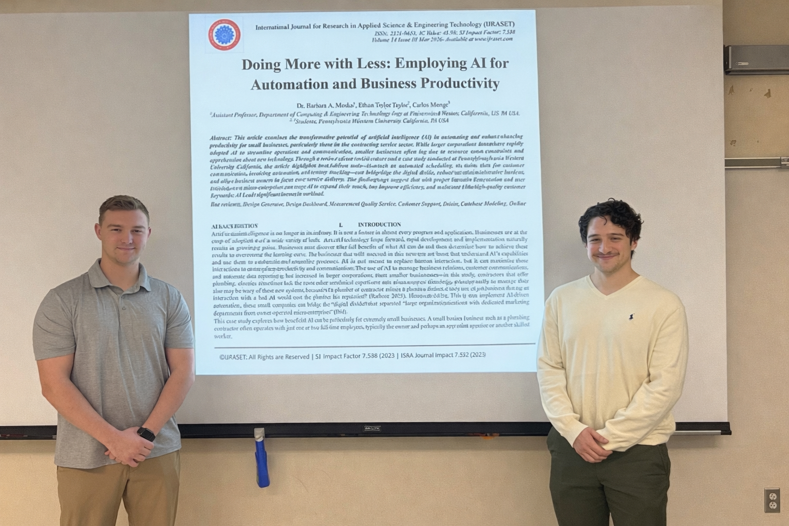 ethan taylor and carlos monge with their research paper